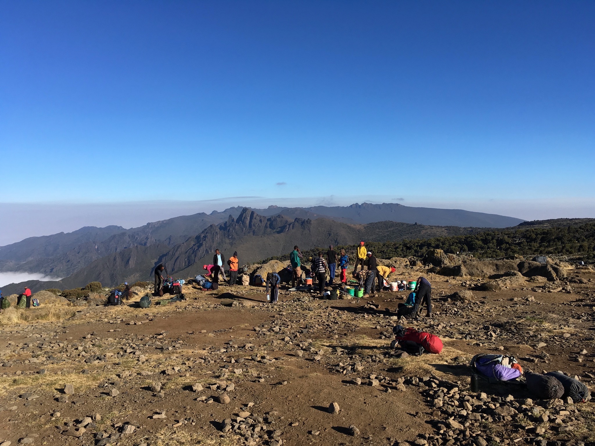 A group of porters gather on Mount Kilimanjaro, above the clouds